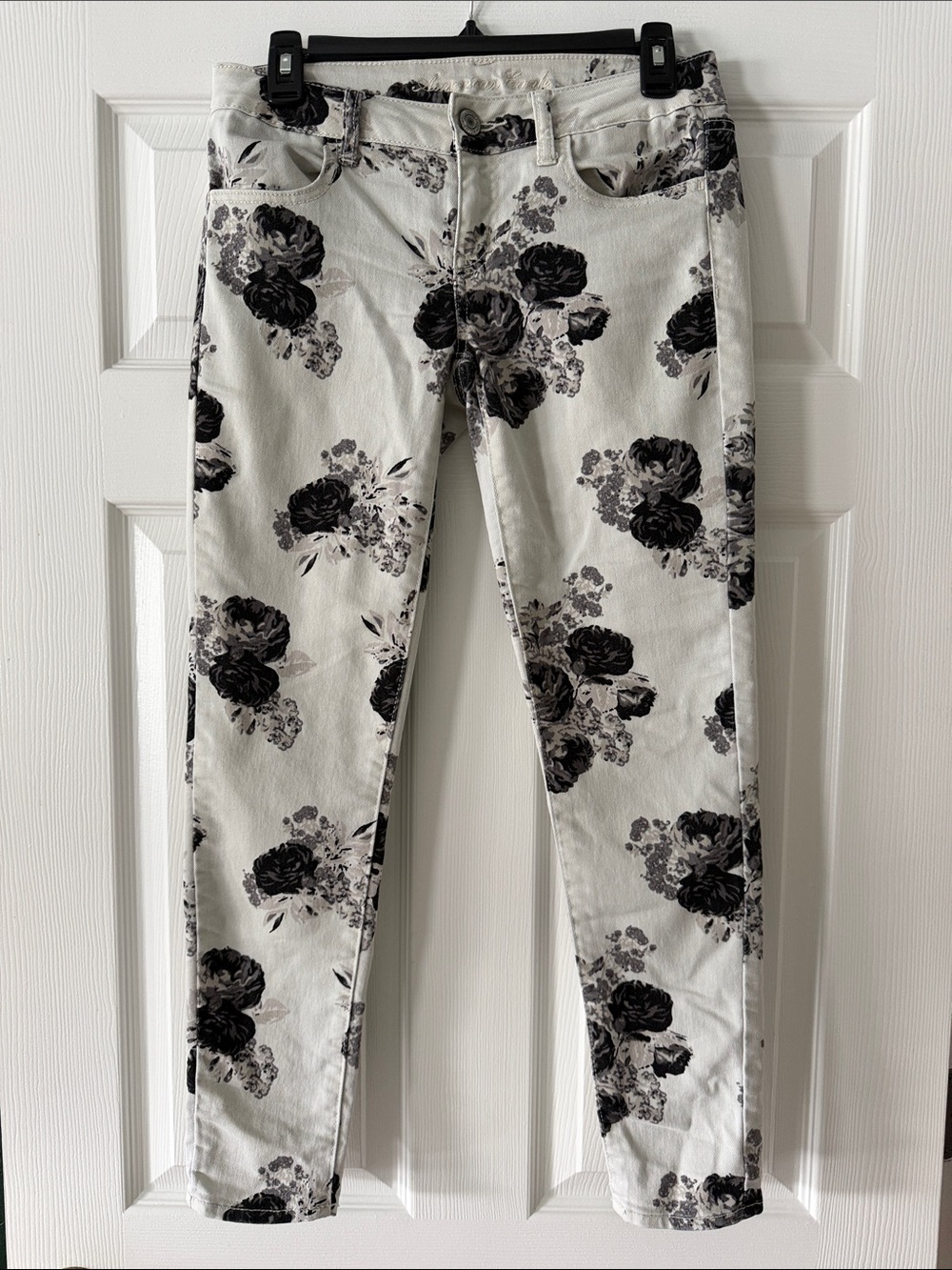 American Eagle Outfitters Black Floral Skinny Jeans on White